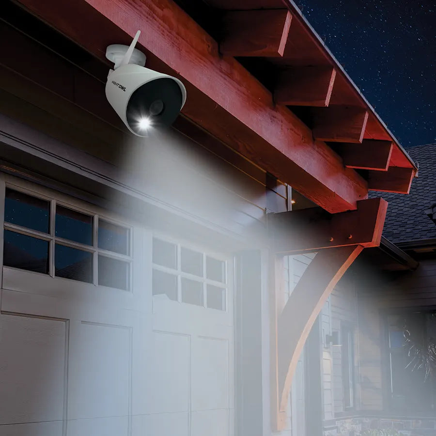 wi-fi- camera on the side of a house with spotlight shining