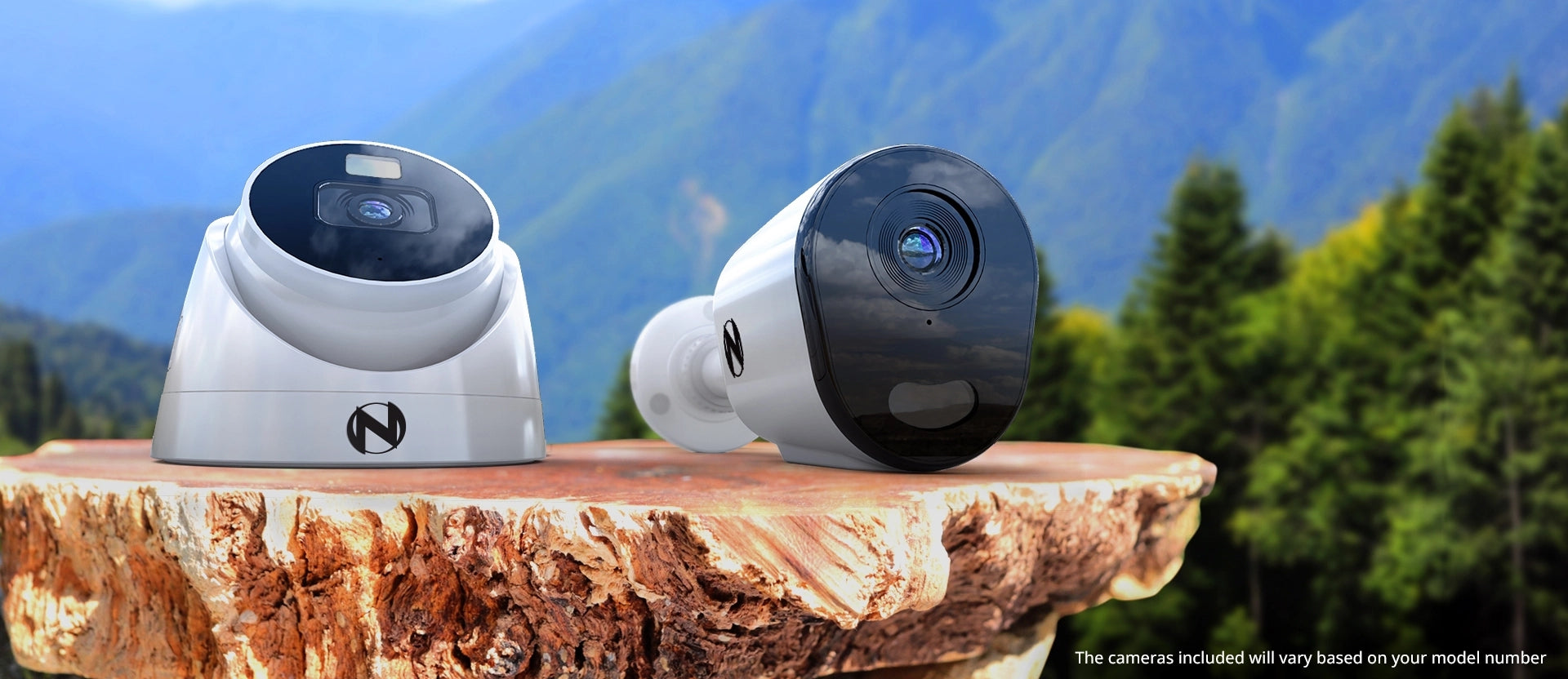 two security cameras on table with forest background